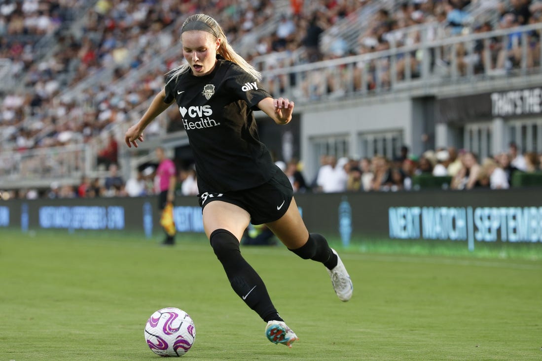 Aug 27, 2023; Washington, District of Columbia, USA; Washington Spirit defender Camryn Biegalski (30) controls the ball against Portland Thorns FC at Audi Field. Mandatory Credit: Amber Searls-USA TODAY Sports