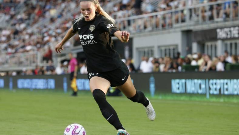 Aug 27, 2023; Washington, District of Columbia, USA; Washington Spirit defender Camryn Biegalski (30) controls the ball against Portland Thorns FC at Audi Field. Mandatory Credit: Amber Searls-USA TODAY Sports