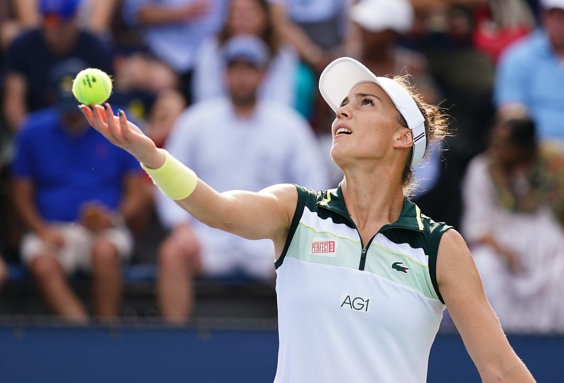 Aug 30, 2023; Flushing, NY, USA; Bernarda Pera of the United States serves against Xiyu Wang of China on day three of the 2023 U.S. Open tennis tournament at the USTA Billie Jean King National Tennis Center. Mandatory Credit: Jerry Lai-USA TODAY Sports