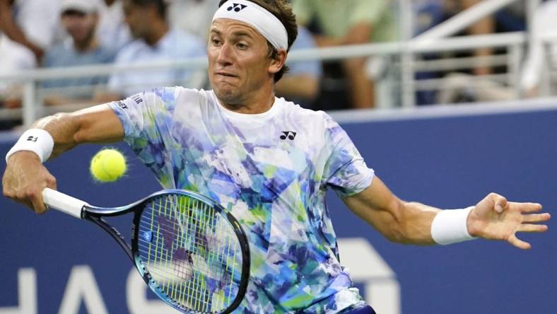 Aug 30, 2023; Flushing, NY, USA; Casper Ruud of Norway hits to Zhizhen Zhang of China on day three of the 2023 U.S. Open tennis tournament at USTA Billie Jean King National Tennis Center. Mandatory Credit: Danielle Parhizkaran-USA TODAY Sports