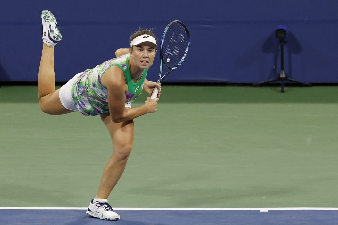 Aug 31, 2023; Flushing, NY, USA; Linda Noskova of the Czech Republic serves against Ons Jabeur of Tunisia (not pictured) on day four of the 2023 U.S. Open tennis tournament at USTA Billie Jean King National Tennis Center. Mandatory Credit: Geoff Burke-USA TODAY Sports