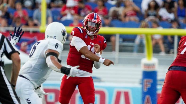 Florida Atlantic quarterback Casey Thompson (11) passes during the second quarter against Monmouth at FAU Stadium on Saturday, September 2, 2023, in Boca Raton, FL.