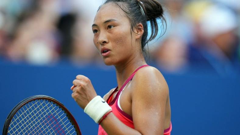 Sep 4, 2023; Flushing, NY, USA; Qinwen Zheng of China reacts after winning a point against Ons Jabeur of Tunisia on day eight of the 2023 U.S. Open tennis tournament at USTA Billie Jean King National Tennis Center. Mandatory Credit: Danielle Parhizkaran-USA TODAY Sports