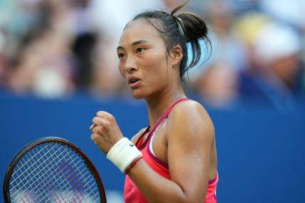 Sep 4, 2023; Flushing, NY, USA; Qinwen Zheng of China reacts after winning a point against Ons Jabeur of Tunisia on day eight of the 2023 U.S. Open tennis tournament at USTA Billie Jean King National Tennis Center. Mandatory Credit: Danielle Parhizkaran-USA TODAY Sports