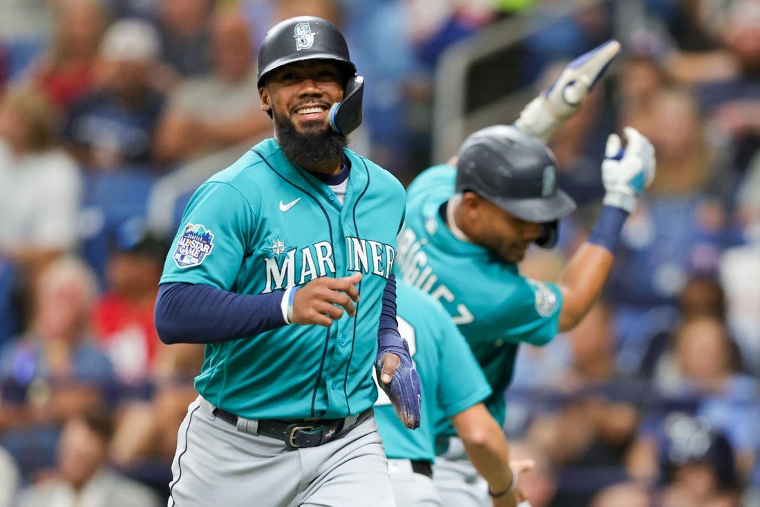 Sep 9, 2023; St. Petersburg, Florida, USA;  Seattle Mariners right fielder Teoscar Hernandez (35) celebrates after scoring a run against the Tampa Bay Rays in the first inning at Tropicana Field. Mandatory Credit: Nathan Ray Seebeck-USA TODAY Sports