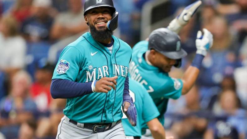 Sep 9, 2023; St. Petersburg, Florida, USA;  Seattle Mariners right fielder Teoscar Hernandez (35) celebrates after scoring a run against the Tampa Bay Rays in the first inning at Tropicana Field. Mandatory Credit: Nathan Ray Seebeck-USA TODAY Sports