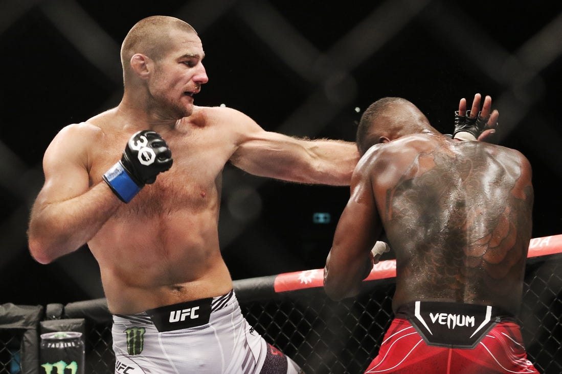 Sep 9, 2023; Sydney, NSW, AUSTRALIA; Israel Adesanya (red gloves) fights Sean Strickland (blue gloves) during UFC 293 at Qudos Bank Arena. Mandatory Credit: Jasmin Frank-USA TODAY Sports