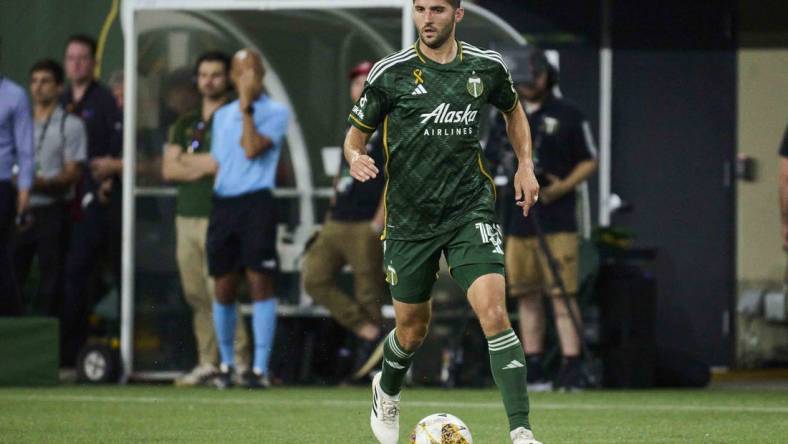 Sep 9, 2023; Portland, Oregon, USA; Portland Timbers defender Eric Miller (15) controls the ball during the first half against Los Angeles FC at Providence Park. Mandatory Credit: Troy Wayrynen-USA TODAY Sports