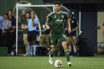Sep 9, 2023; Portland, Oregon, USA; Portland Timbers defender Eric Miller (15) controls the ball during the first half against Los Angeles FC at Providence Park. Mandatory Credit: Troy Wayrynen-USA TODAY Sports