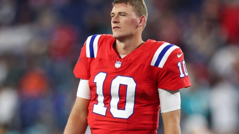 Sep 17, 2023; Foxborough, Massachusetts, USA; New England Patriots quarterback Mac Jones (10) reacts before playing the Miami Dolphins at Gillette Stadium. Mandatory Credit: Paul Rutherford-USA TODAY Sports