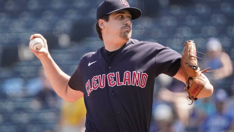 Sep 18, 2023; Kansas City, Missouri, USA; Cleveland Guardians starting pitcher Cal Quantrill (47) delivers against the Kansas City Royals in the first inning at Kauffman Stadium. Mandatory Credit: Denny Medley-USA TODAY Sports