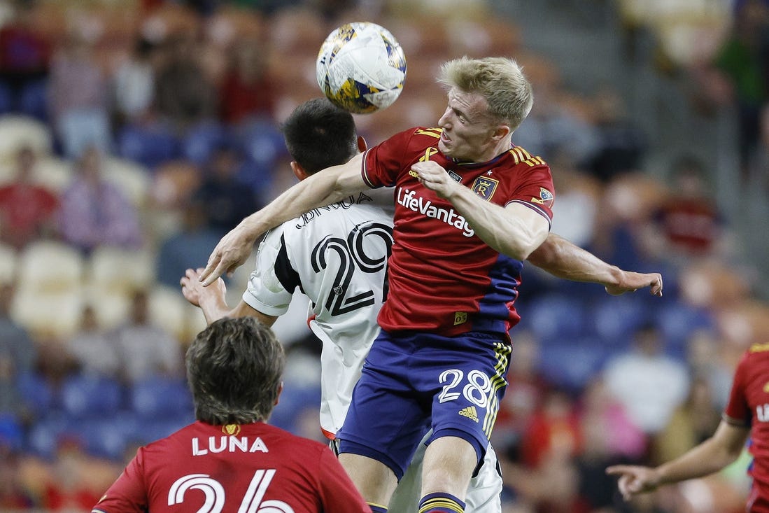 Sep 20, 2023; Sandy, Utah, USA; Real Salt Lake defender Jasper Loffelsend (28) and FC Dallas defender Sam Junqua (29) battle in the second half at America First Field. Mandatory Credit: Jeff Swinger-USA TODAY Sports