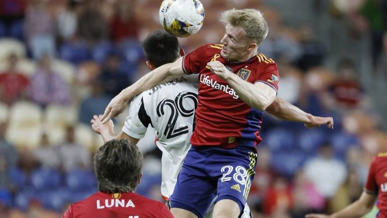 Sep 20, 2023; Sandy, Utah, USA; Real Salt Lake defender Jasper Loffelsend (28) and FC Dallas defender Sam Junqua (29) battle in the second half at America First Field. Mandatory Credit: Jeff Swinger-USA TODAY Sports