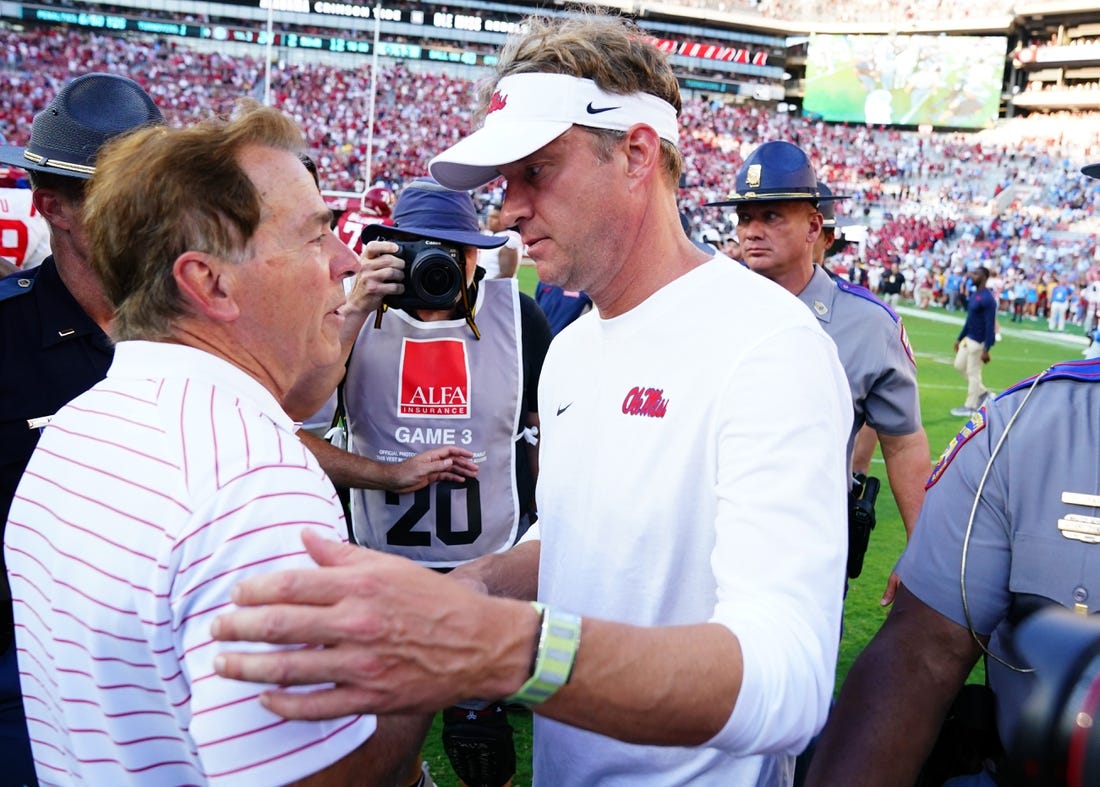 Sep 23, 2023; Tuscaloosa, Alabama, USA; Alabama Crimson Tide head coach Nick Saban greets Mississippi Rebels head coach Lane Kiffin midfield after Alabama defeated the Rebels 24-10 at Bryant-Denny Stadium.  Mandatory Credit: John David Mercer-USA TODAY Sports