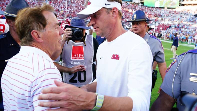 Sep 23, 2023; Tuscaloosa, Alabama, USA; Alabama Crimson Tide head coach Nick Saban greets Mississippi Rebels head coach Lane Kiffin midfield after Alabama defeated the Rebels 24-10 at Bryant-Denny Stadium.  Mandatory Credit: John David Mercer-USA TODAY Sports