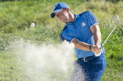 September 27, 2023; Rome, ITA; Team Europe golfer Rory McIlroy hits his bunker shot on the 16th hole during a practice day for the Ryder Cup golf competition at Marco Simone Golf and Country Club. Mandatory Credit: Kyle Terada-USA TODAY Sports