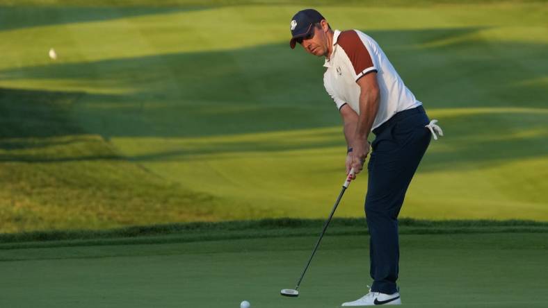 Sep 30, 2023; Rome, ITALY;  Team Europe golfer Rory McIlroy putts on the 16th green during day two fourballs round for the 44th Ryder Cup golf competition at Marco Simone Golf and Country Club. Mandatory Credit: Kyle Terada-USA TODAY Sports