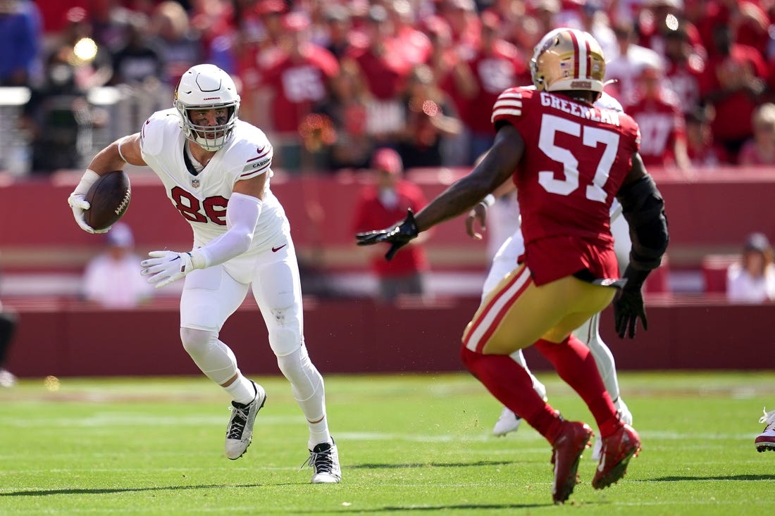 Tight end Zach Ertz (86) runs with the ball after making a catch next to San Francisco 49ers linebacker Dre Greenlaw (57) in the second quarter at Levi's Stadium. Mandatory Credit: Cary Edmondson-USA TODAY Sports