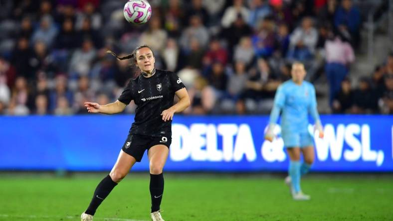 Oct 2, 2023; Los Angeles, California, USA; Angel City FC defender Megan Reid (6) passes the ball during the second half against the Orlando Pride at BMO Stadium. Mandatory Credit: Gary A. Vasquez-USA TODAY Sports