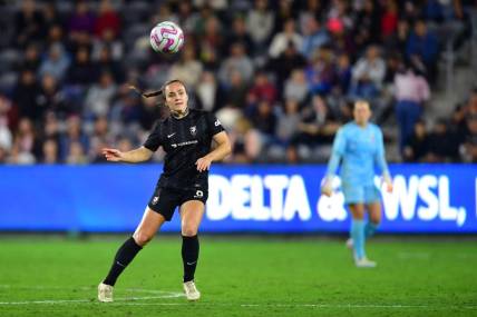 Oct 2, 2023; Los Angeles, California, USA; Angel City FC defender Megan Reid (6) passes the ball during the second half against the Orlando Pride at BMO Stadium. Mandatory Credit: Gary A. Vasquez-USA TODAY Sports