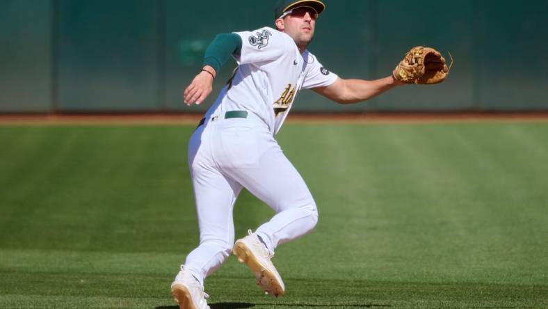 Sep 24, 2023; Oakland, California, USA; Oakland Athletics infielder Kevin Smith (4) against the Detroit Tigers during the eighth inning at Oakland-Alameda County Coliseum. Mandatory Credit: Robert Edwards-USA TODAY Sports