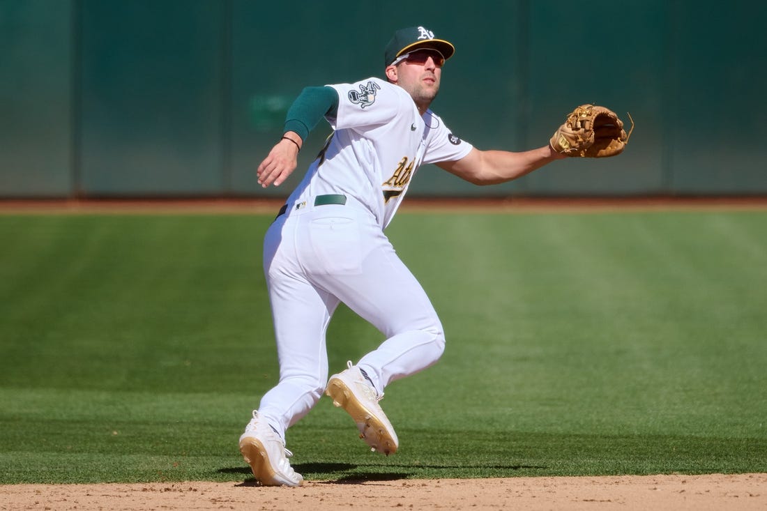 Sep 24, 2023; Oakland, California, USA; Oakland Athletics infielder Kevin Smith (4) against the Detroit Tigers during the eighth inning at Oakland-Alameda County Coliseum. Mandatory Credit: Robert Edwards-USA TODAY Sports