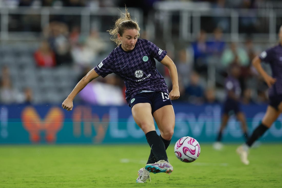 Oct 6, 2023; Louisville, Kentucky, USA; Racing Louisville FC defender Julia Lester (15) passes the ball in the second half against the Orlando Pride at Lynn Family Stadium. Mandatory Credit: EM Dash-USA TODAY Sports