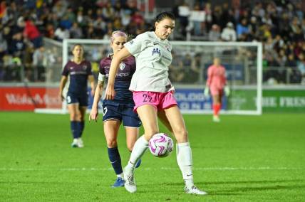 Oct 7, 2023; Cary, North Carolina, USA; San Diego Wave FC midfielder Taylor Kornieck (22) controls the ball against North Carolina Courage midfielder Denise O'Sullivan (10) during the second half at WakeMed Soccer Park. Mandatory Credit: Rob Kinnan-USA TODAY Sports