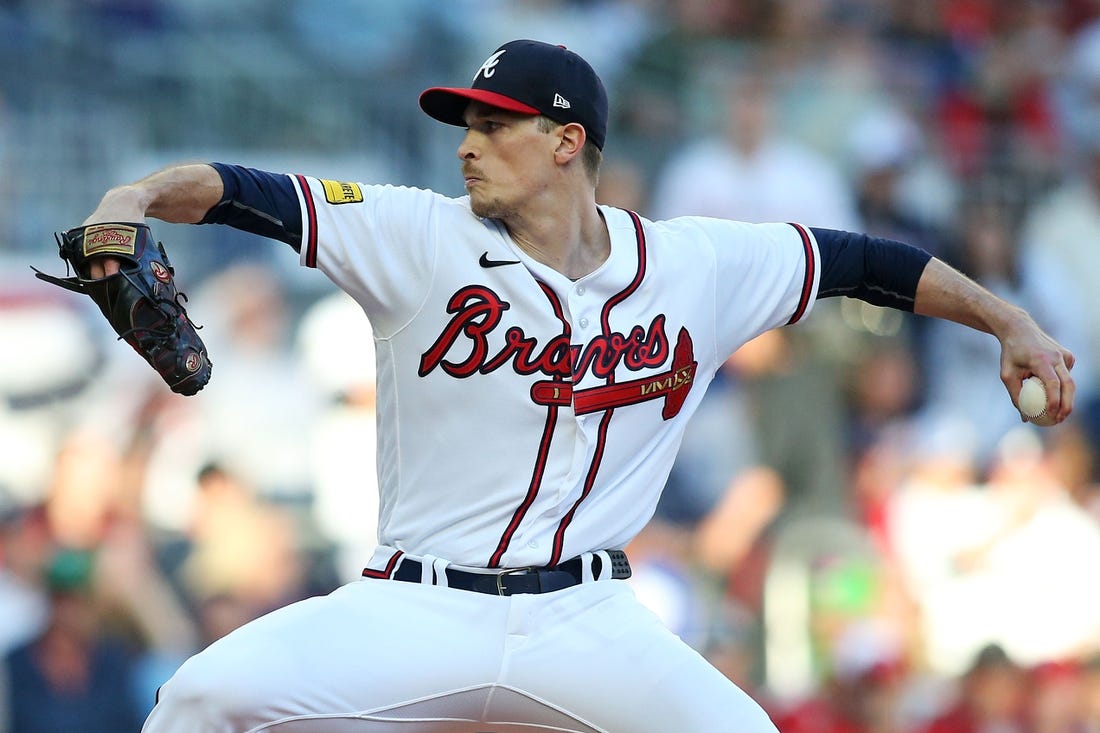 Oct 9, 2023; Cumberland, Georgia, USA; Atlanta Braves starting pitcher Max Fried (54) pitches during the first inning against the Philadelphia Phillies in game two of the NLDS for the 2023 MLB playoffs at Truist Park. Mandatory Credit: Brett Davis-USA TODAY Sports