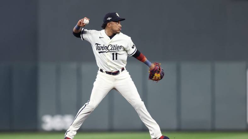 Oct 11, 2023; Minneapolis, Minnesota, USA; Minnesota Twins second baseman Jorge Polanco (11) throws to first for an out in the eighth inning against the Houston Astros during game four of the ALDS for the 2023 MLB playoffs at Target Field. Mandatory Credit: Jesse Johnson-USA TODAY Sports