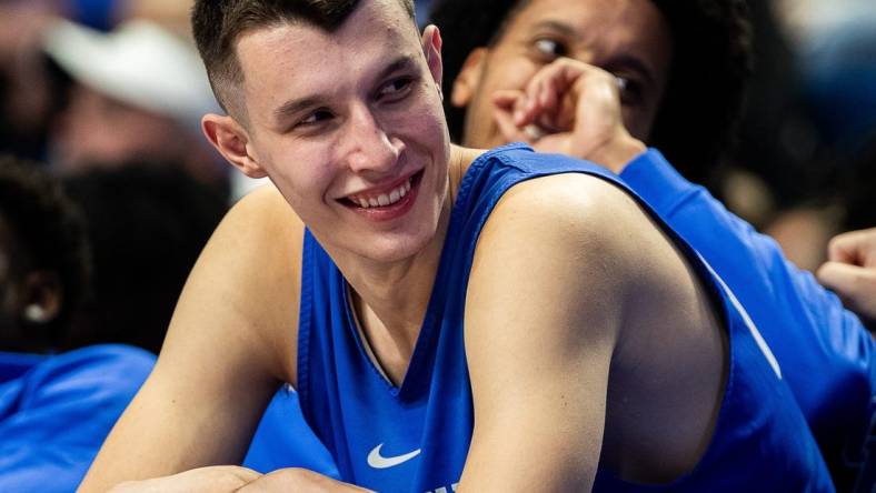 Zonimir Ivisic, the 7-foot-2 freshman center from Croatia, laughed with his teammates druing Big Blue Madness on Friday evening at Rupp Arena. Oct. 13, 2023