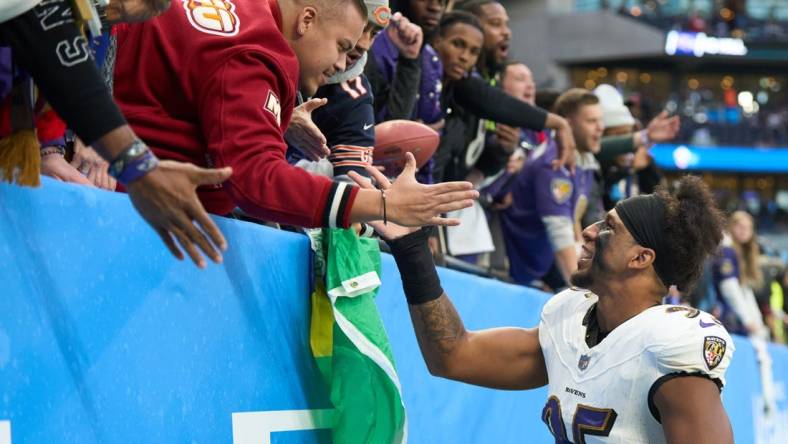 Oct 15, 2023; London, United Kingdom; Baltimore Ravens linebacker Tavius Robinson (95) after an NFL International Series game at Tottenham Hotspur Stadium. Mandatory Credit: Peter van den Berg-USA TODAY Sports