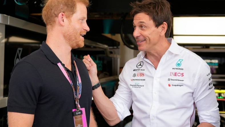 Prince Harry, Duke of Sussex, left, chats with Toto Wolff, Team Principal and CEO of Mercedes-AMG Petronas, in the garage at the Formula 1 Lenovo United States Grand Prix at Circuit of the Americas on Sunday October 22, 2023.