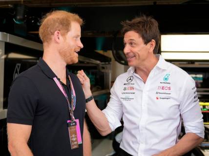 Prince Harry, Duke of Sussex, left, chats with Toto Wolff, Team Principal and CEO of Mercedes-AMG Petronas, in the garage at the Formula 1 Lenovo United States Grand Prix at Circuit of the Americas on Sunday October 22, 2023.