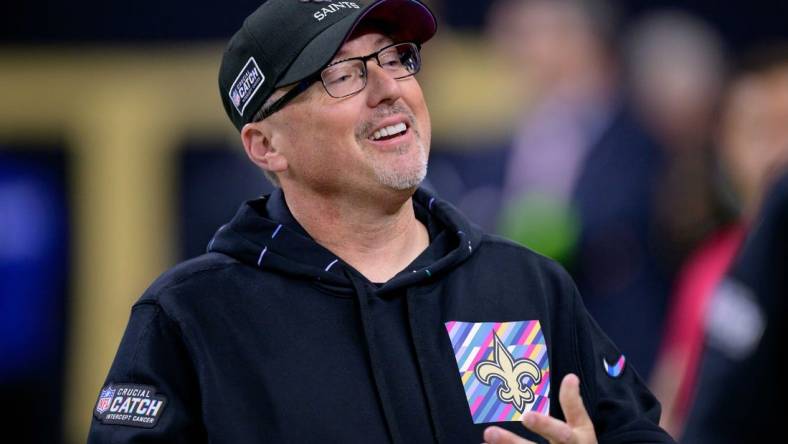 Oct 19, 2023; New Orleans, Louisiana, USA; New Orleans Saints offensive coordinator Pete Carmichael smiles before a game against the Jacksonville Jaguars at the Caesars Superdome. Mandatory Credit: Matthew Hinton-USA TODAY Sports