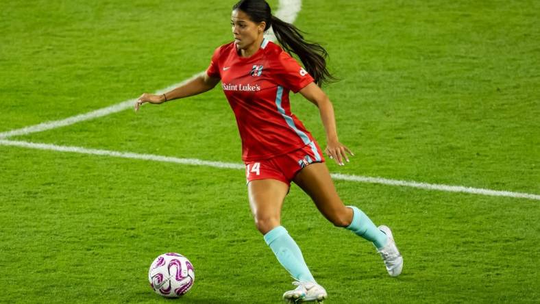 Oct 4, 2023; Kansas City, Kansas, USA; Kansas City Current midfielder Chardonnay Curran (14) controls the ball during the second half against Monterrey at Children   s Mercy Park. Mandatory Credit: Jay Biggerstaff-USA TODAY Sports