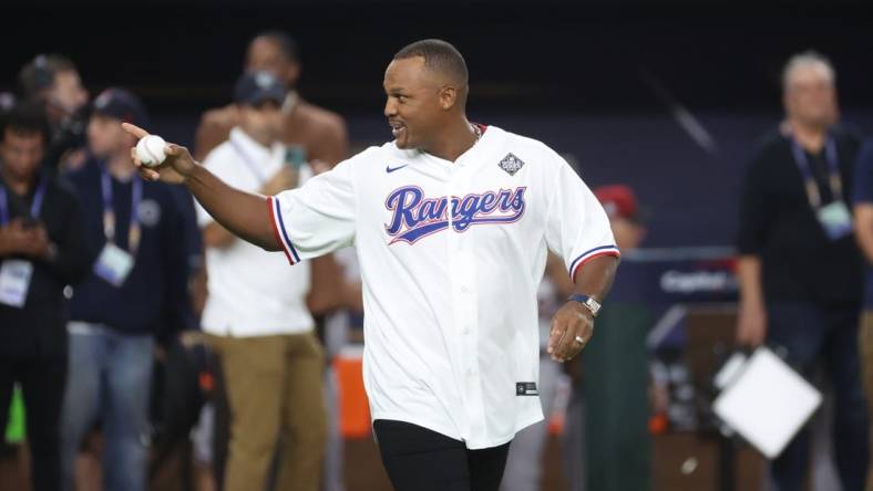 Oct 28, 2023; Arlington, TX, USA; Former Texas Rangers player Adrian Beltre walks to the mound to throw out the ceremonial first pitch before the game between the Texas Rangers and the Arizona Diamondbacks in game two of the 2023 World Series at Globe Life Field. Mandatory Credit:Kevin Jairaj-USA TODAY Sports