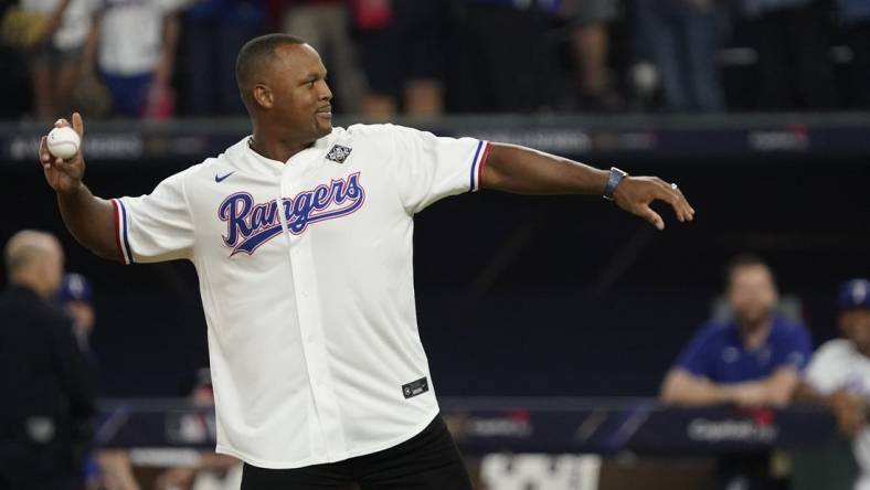 Oct 28, 2023; Arlington, TX, USA; Former Texas Rangers player Adrian Beltre throws out the ceremonial first pitch before the game between the Texas Rangers and the Arizona Diamondbacks in game two of the 2023 World Series at Globe Life Field. Mandatory Credit:Raymond Carlin III-USA TODAY Sports