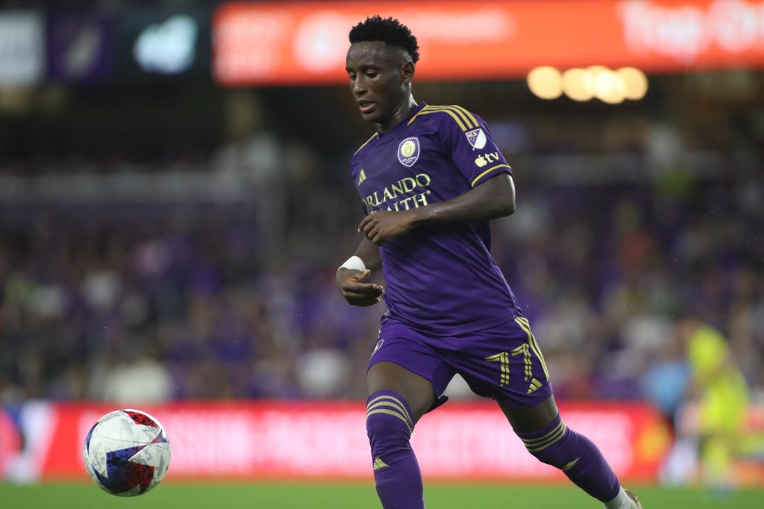 Oct 30, 2023; Orlando, Florida, USA; Orlando City forward Ivan Angulo (77) plays the ball in the second half against the Nashville SC of game one in a round one match of the 2023 MLS Cup Playoffs at Exploria Stadium. Mandatory Credit: Morgan Tencza-USA TODAY Sports