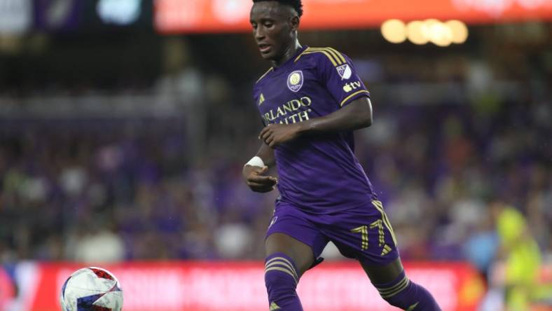 Oct 30, 2023; Orlando, Florida, USA; Orlando City forward Ivan Angulo (77) plays the ball in the second half against the Nashville SC of game one in a round one match of the 2023 MLS Cup Playoffs at Exploria Stadium. Mandatory Credit: Morgan Tencza-USA TODAY Sports