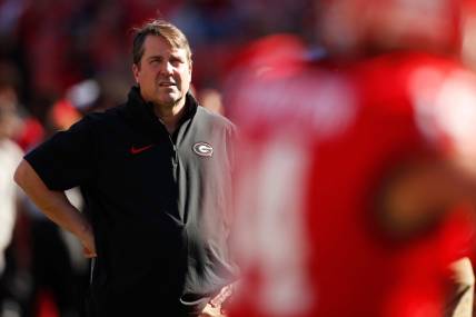 Georgia Co-Defensive Coordinator Will Muschamp looks on during warm ups before the start of a NCAA college football game against Missouri in Athens, Ga., on Saturday, Nov. 4, 2023.