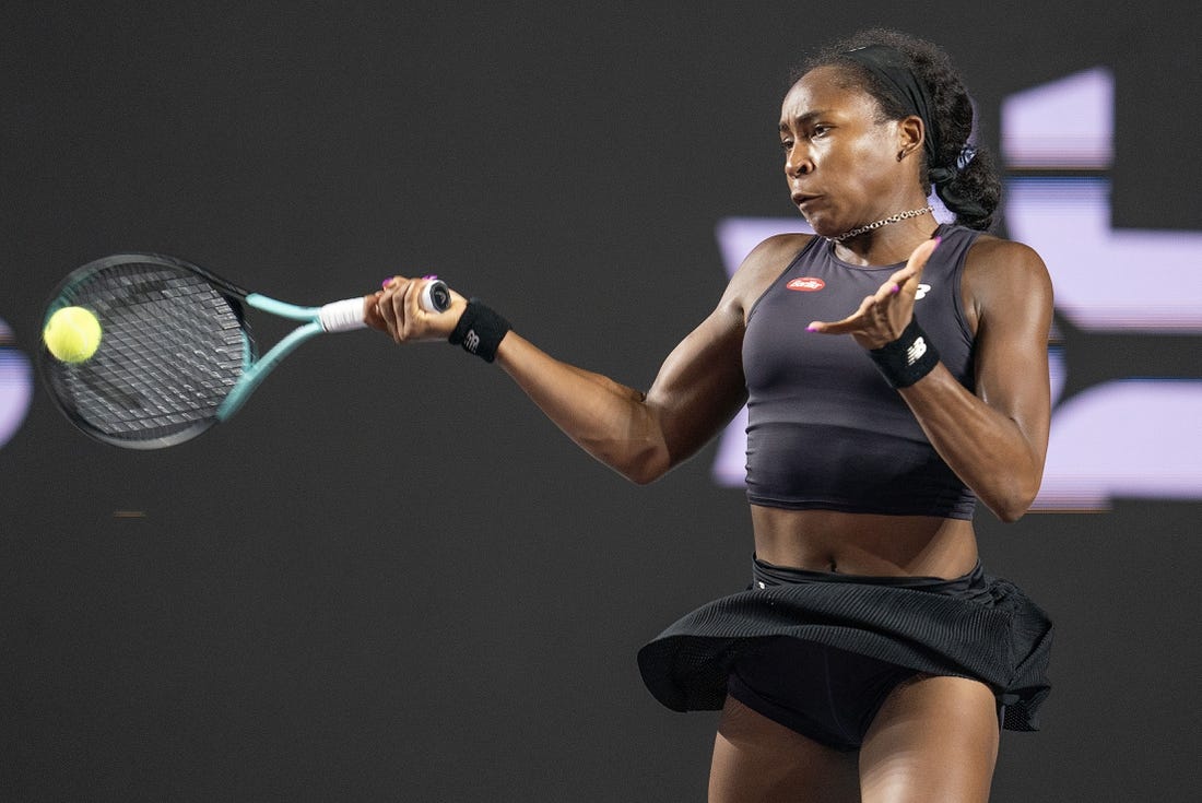 Nov 4, 2023; Cancun, Mexico; Coco Gauff (USA) returns a shot during her match against Jessica Pegula (USA) on day seven of the GNP Saguaros WTA Finals Cancun. Mandatory Credit: Susan Mullane-USA TODAY Sports