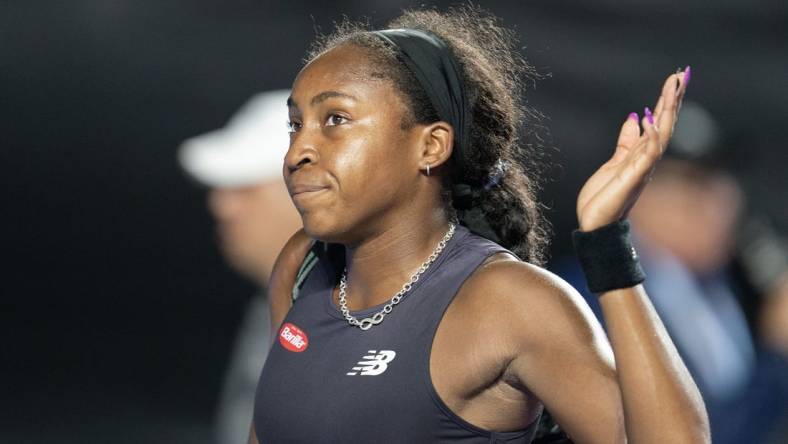 Nov 4, 2023; Cancun, Mexico; Coco Gauff (USA) waves as she leaves the court after her match against Jessica Pegula (USA) on day seven of the GNP Saguaros WTA Finals Cancun. Mandatory Credit: Susan Mullane-USA TODAY Sports