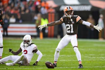 Nov 5, 2023; Cleveland, Ohio, USA; Cleveland Browns cornerback Denzel Ward (21) celebrates his broken up pass intended for Arizona Cardinals wide receiver Marquise Brown (2) during the third quarter at Cleveland Browns Stadium. Mandatory Credit: Scott Galvin-USA TODAY Sports