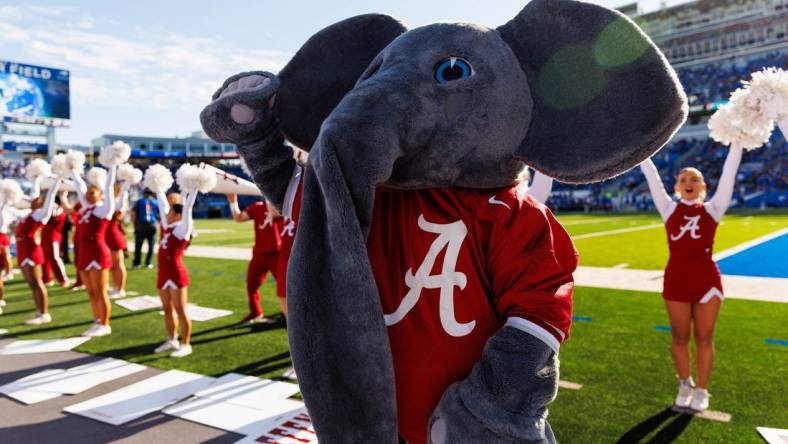 Nov 11, 2023; Lexington, Kentucky, USA; Alabama Crimson Tide mascot Big Al waves to the crowd during the third quarter against the Kentucky Wildcats at Kroger Field. Mandatory Credit: Jordan Prather-USA TODAY Sports