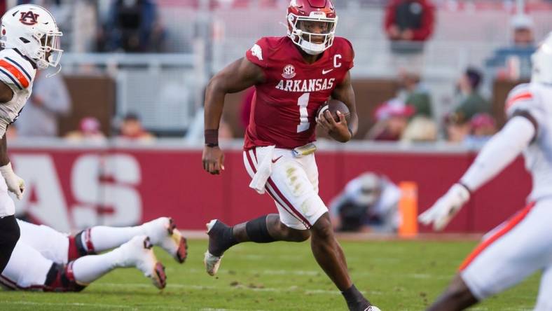 Nov 11, 2023; Fayetteville, Arkansas, USA;  Arkansas Razorbacks quarterback KJ Jefferson (1) runs the ball during the second quarter in the game against the Auburn Tigersat Donald W. Reynolds Razorback Stadium. Mandatory Credit: Brett Rojo-USA TODAY Sports