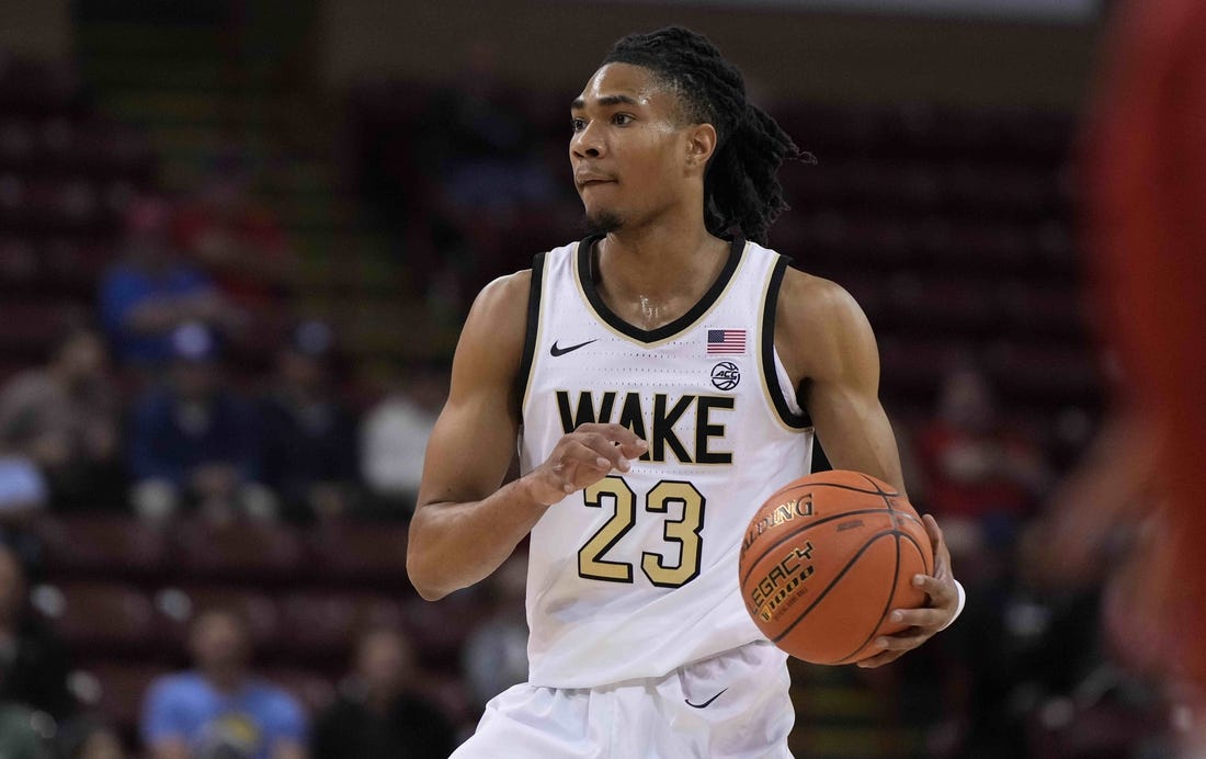 Nov 16, 2023; Charleston, South Carolina, USA; Wake Forest Demon Deacons guard Hunter Sallis (23) brings the ball up court in the first half against the Utah Utes at TD Arena. Mandatory Credit: David Yeazell-USA TODAY Sports