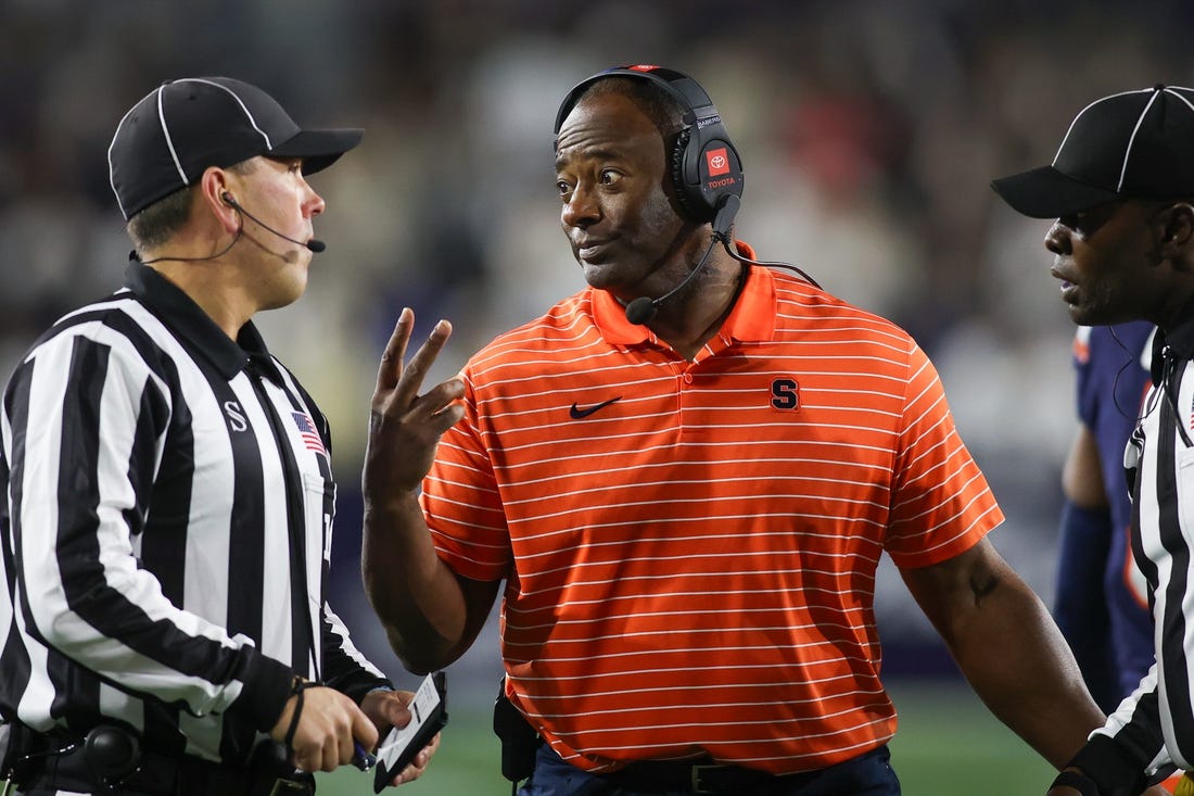 Nov 18, 2023; Atlanta, Georgia, USA; Syracuse Orange head coach Dino Babers talks to a referee against the Georgia Tech Yellow Jackets in the first half at Bobby Dodd Stadium at Hyundai Field. Mandatory Credit: Brett Davis-USA TODAY Sports