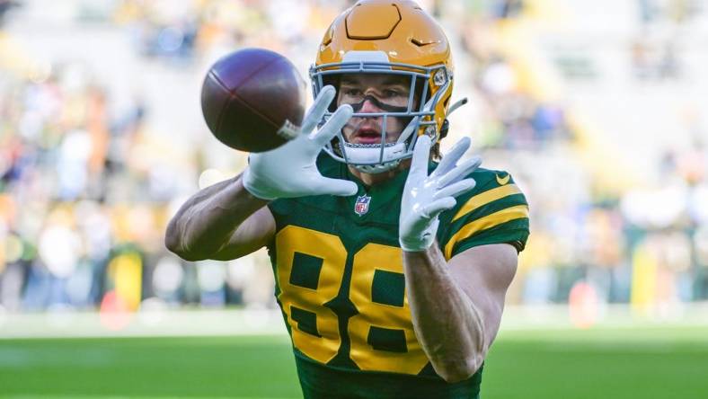 Nov 19, 2023; Green Bay, Wisconsin, USA;  Green Bay Packers tight end Luke Musgrave (88) warms up before game against the Los Angeles Chargers at Lambeau Field. Mandatory Credit: Benny Sieu-USA TODAY Sports