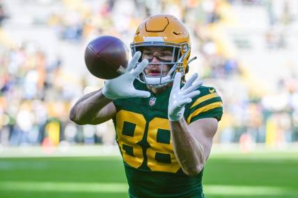 Nov 19, 2023; Green Bay, Wisconsin, USA;  Green Bay Packers tight end Luke Musgrave (88) warms up before game against the Los Angeles Chargers at Lambeau Field. Mandatory Credit: Benny Sieu-USA TODAY Sports